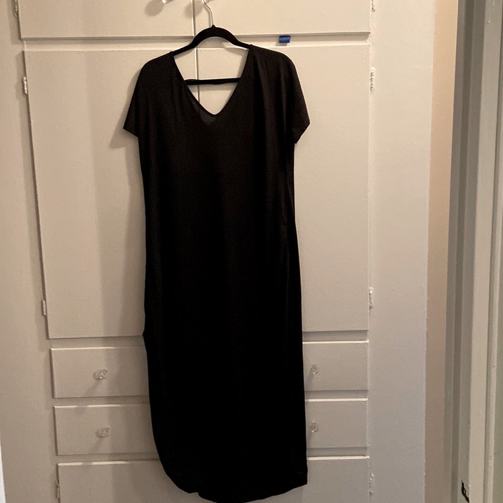 Size large black maxi dress with slits on the side.